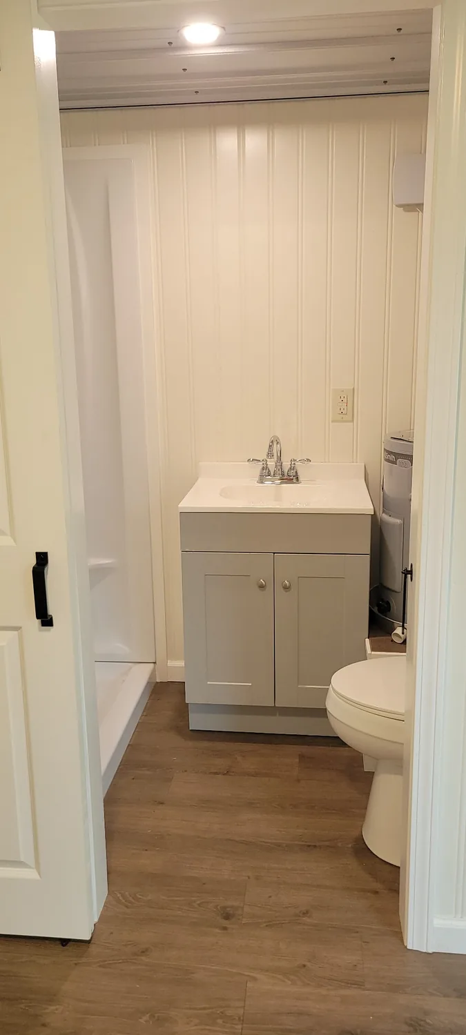 Basecamp Blue bathroom vanity and toilet